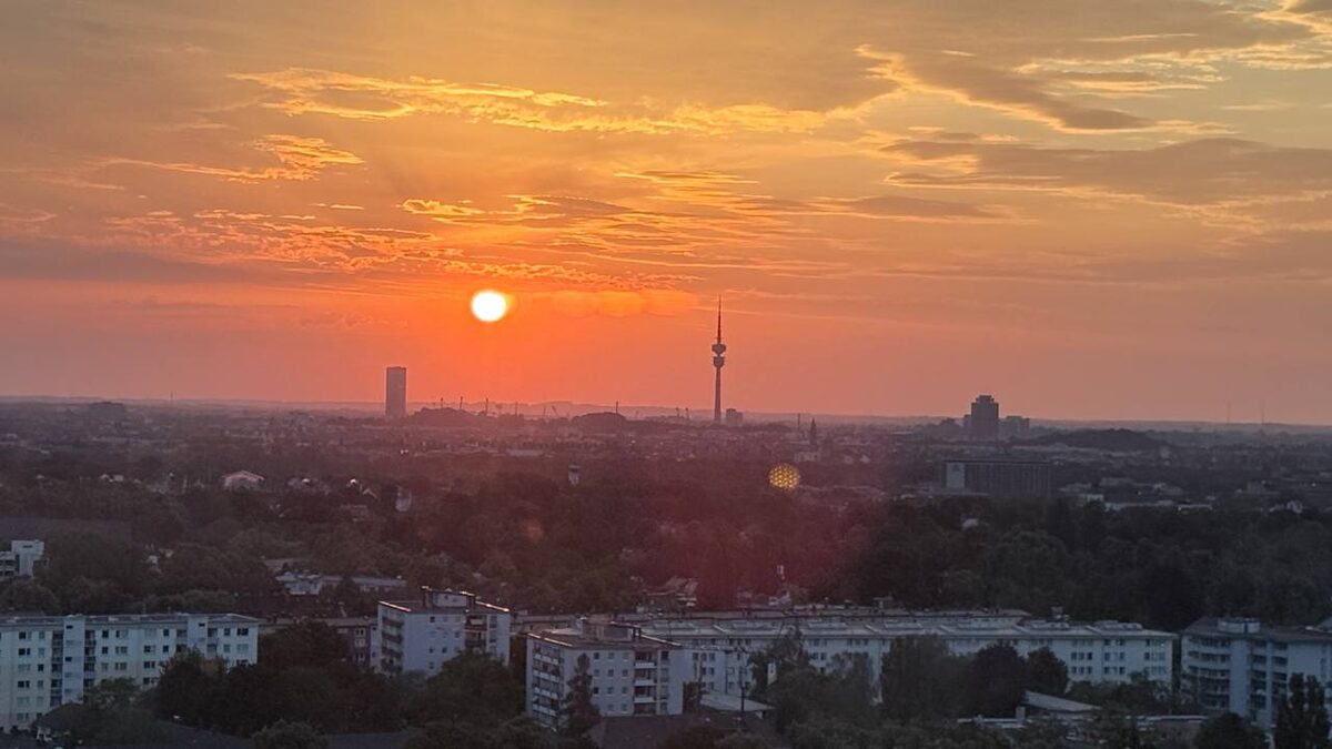Sunset over Munich and the Olympiaturm from the EGYM 17th floor